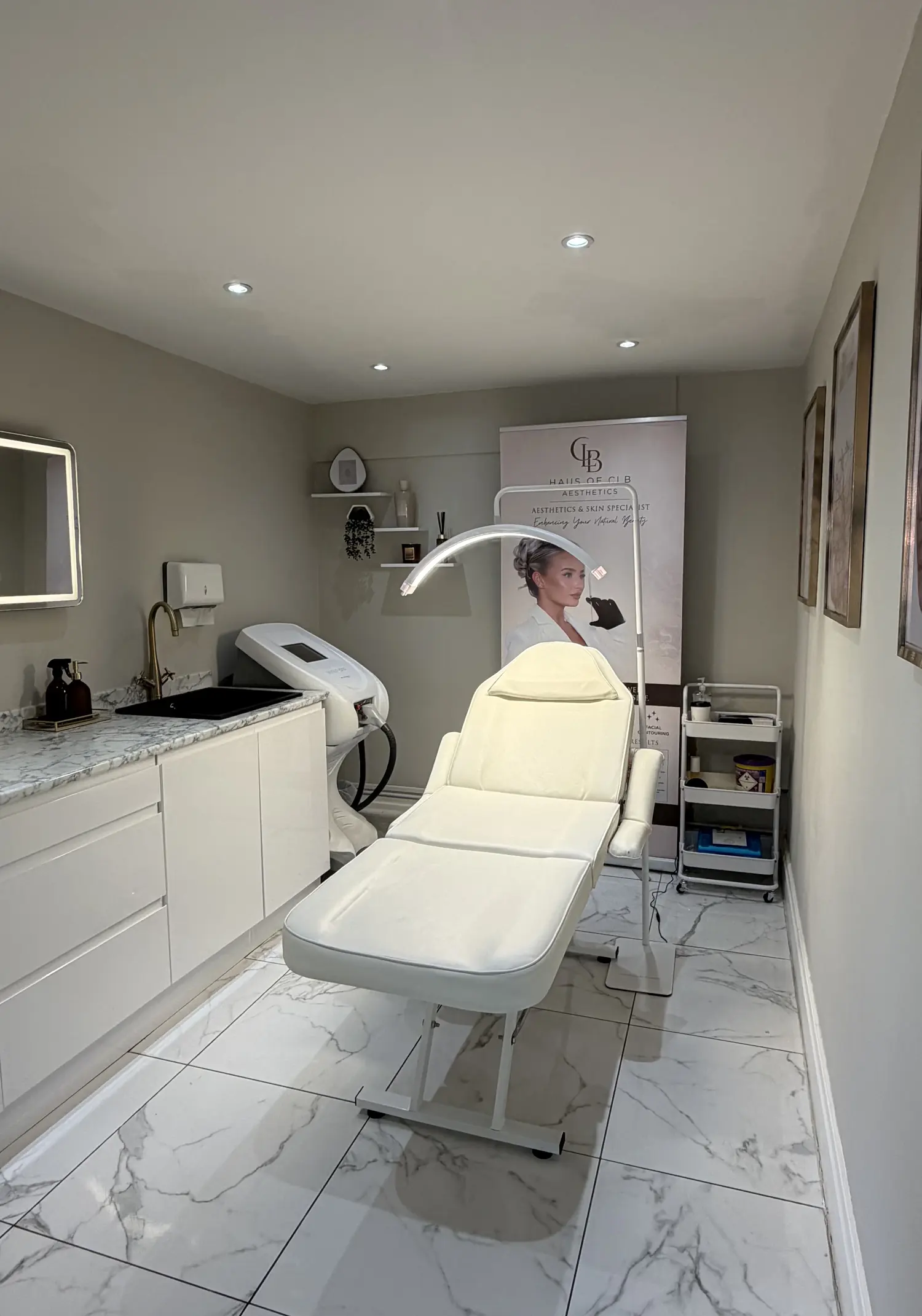 The Haus of CLB treatment room in Prestwich, with marble flooring